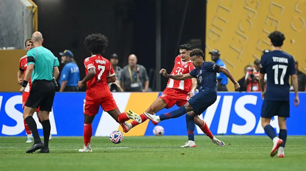Paris St-Germain edged past Bayern Munich to reach the Club World Cup semi-finals in a game overshadowed by a serious ankle injury to Jamal Musiala and featuring two red cards for the French side.